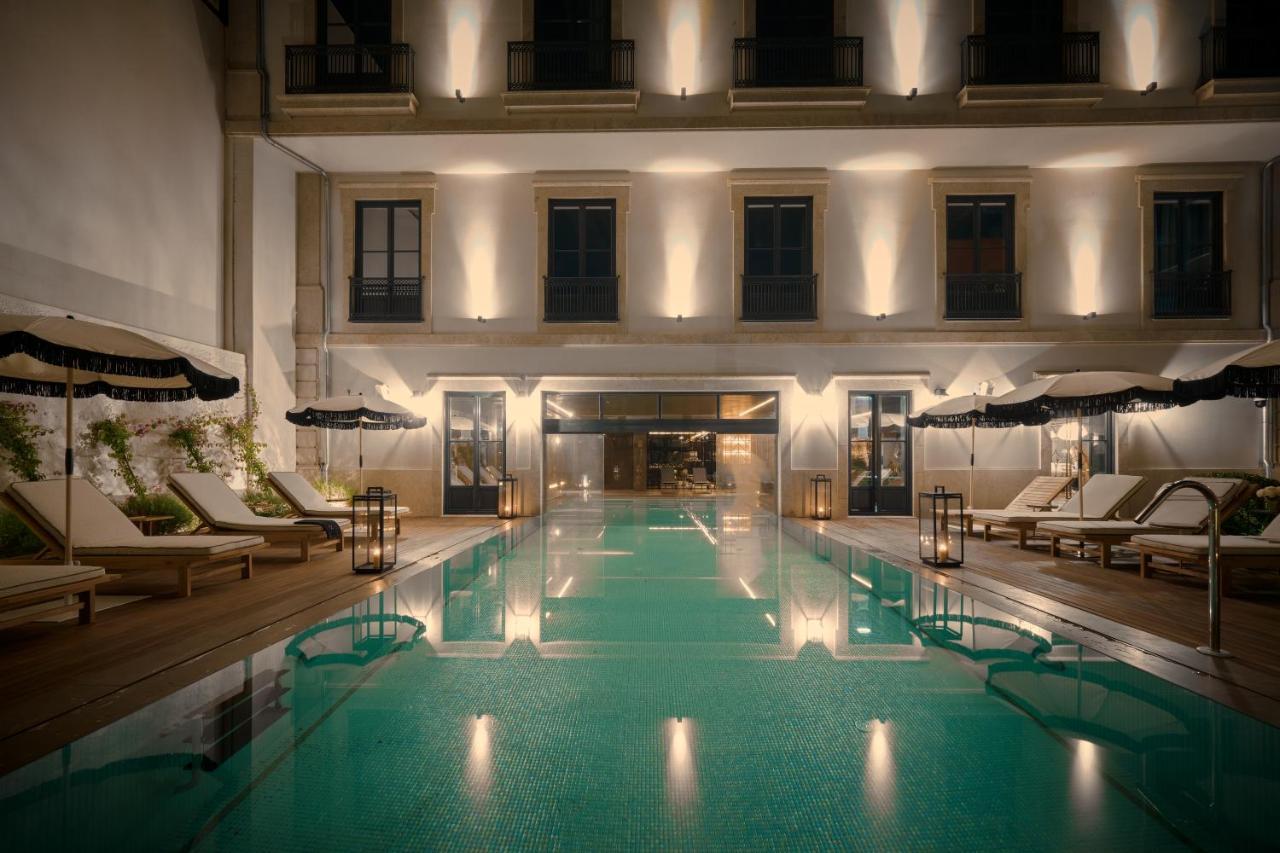 Ga Palace Hotel & Spa, A Xixth-Century Villa Porto Exteriér fotografie The pool at the hotel