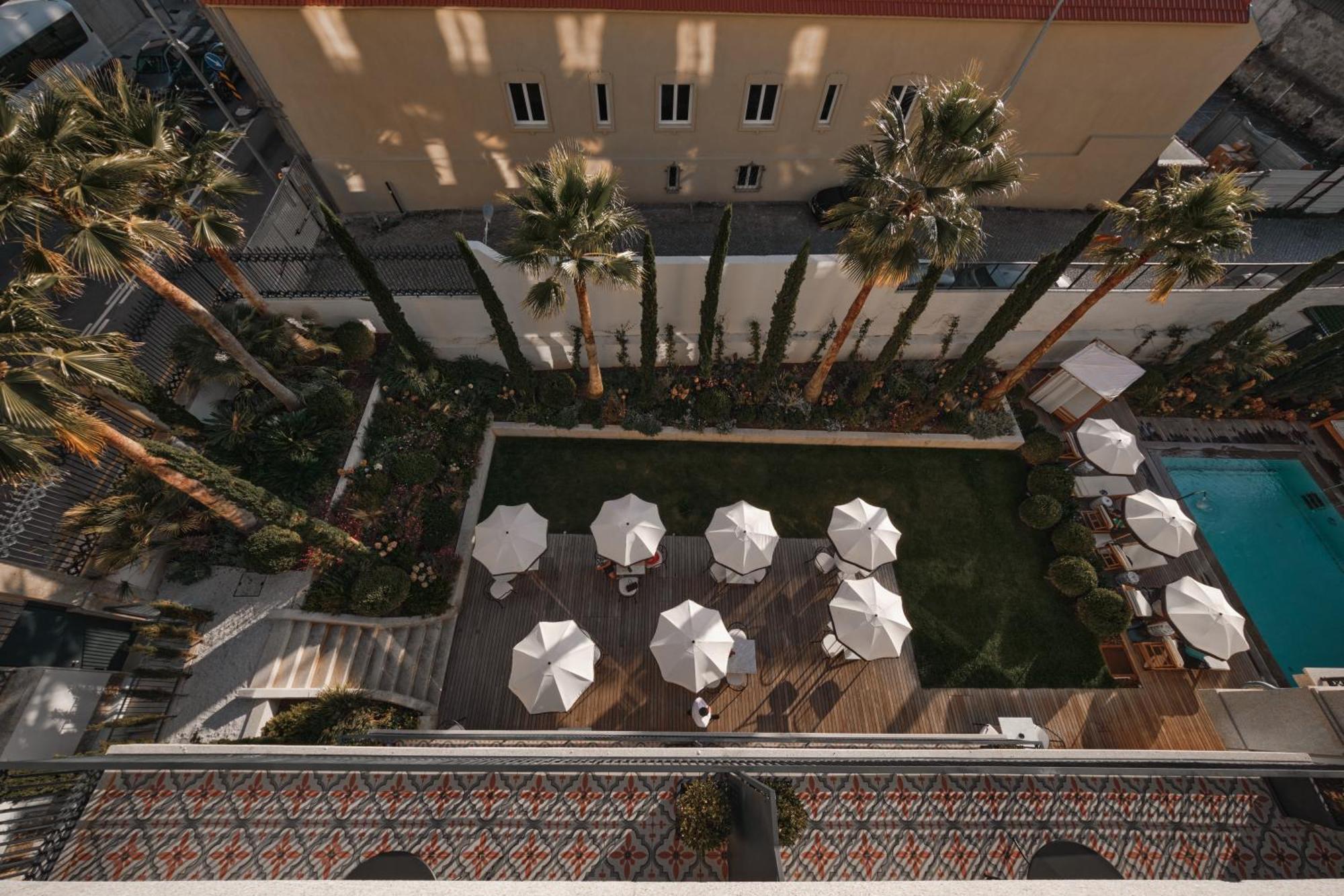 Ga Palace Hotel & Spa, A Xixth-Century Villa Porto Exteriér fotografie The pool at the hotel